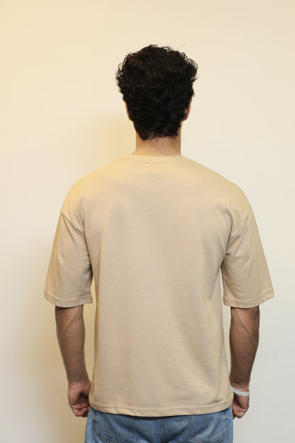 "Beige Oversized Tee with Black Pocket"